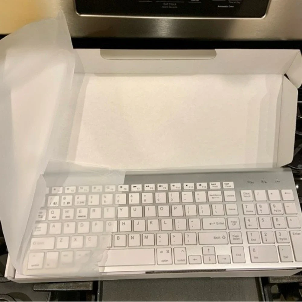 Silver wireless keyboard for pc or tablet